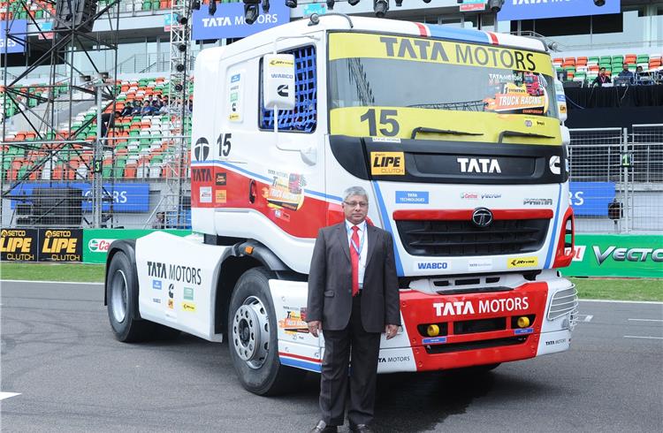 Mr. Ravindra Pisharody, Executive Director, Commercial Vehicles Business Unit, Tata Motors Ltd with Tata Prima race trucks.
