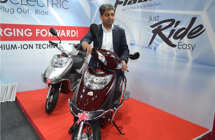 Naveen Munjal with the Flash electric scooter.