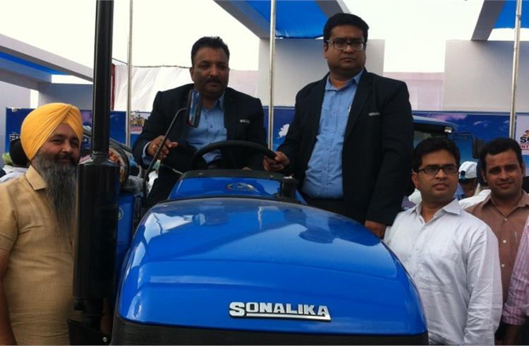 DL Rana, director sales and marketing, with Vivek Goyal, zonal head Sonalika International Tractors at the launch.