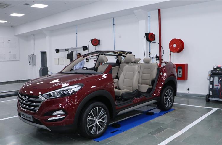 A Tucson cutaway for easier accessibility while training interior parts servicing like steering column, AC cooling coil and seats.