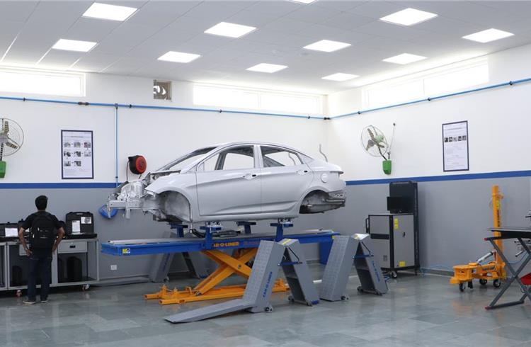 With focus on workmanship, INQC aims to impart body repair training using dent pullers and other special equipment.