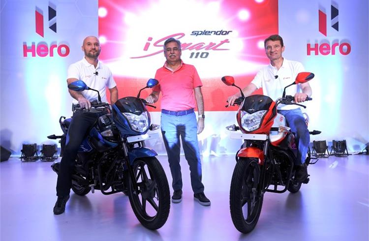 L-R: Malo Le Masson, Head of Global Product Planning; Pawan Munjal, chairman, MD & CEO; and Dr. Markus Braunsperger, Chief Technology Officer of Hero MotoCorp, at the launch of the Splendor iSmart 110