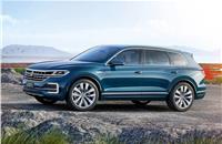 New Touareg spy pictures reveal that the firm’s range-topping SUV will develop the firm’s styling language and interior look in line with that of the now year-old Tiguan.