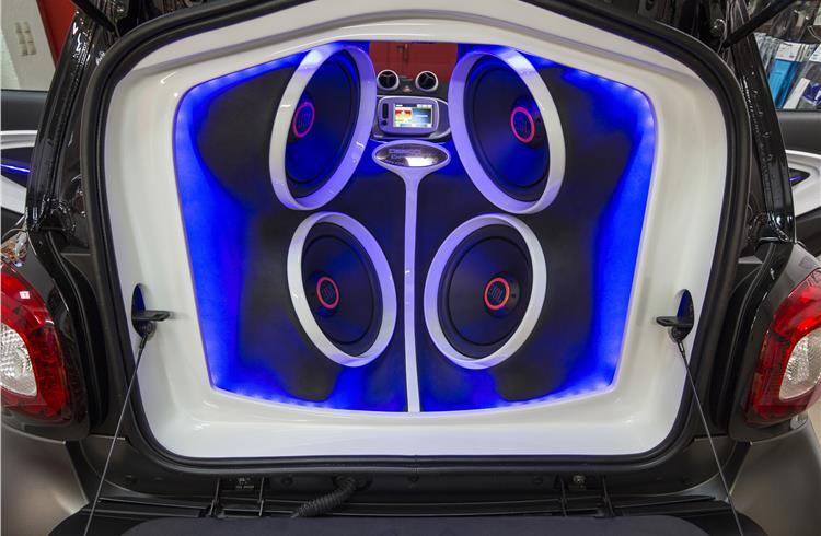 The car features customisable RGB ambient lighting.