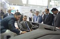 Faurecia Interior Systems' Sameer Raina gives a demo of the product to Ford India's Anurag Mehrotra.