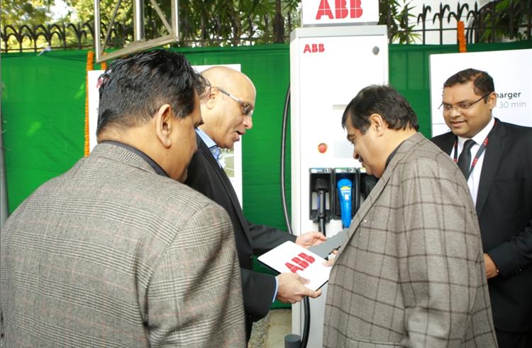 Transport minister Nitin Gadkari with Sanjeev Sharma, MD, ABB India, at the installation of an ABB Terra 53 fast charging station for EVs at the NITI Aayog office on February 15.