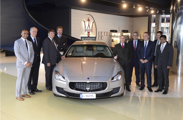 Maserati and Airbus Group executives with Maserati Quattroporte.