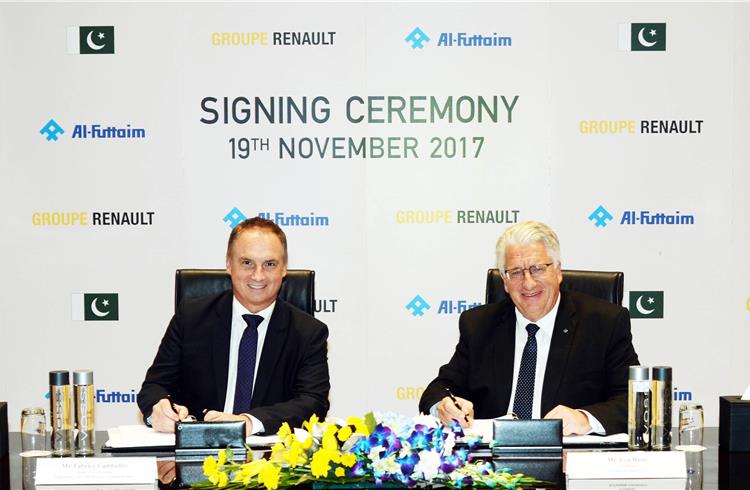 L-R: Fabrice Cambolive, senior VP, chairman of the Africa Middle-East India Region of Groupe Renault, and Len Hunt, president of Al-Futtaim Automotive, sign the deal.