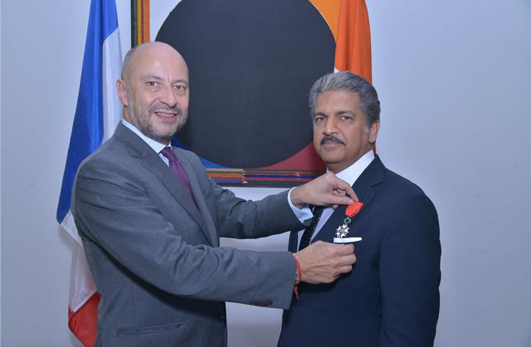 The French ambassador to India, François Richier pins the Chevalier de la Légion d’Honneur award on Anand Mahindra, chairman, Mahindra Group.