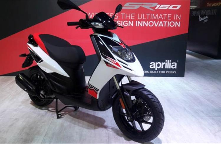 The Aprilia SR 150 combines the feel of a sportsbike with the ease and utility of a scooter, making it a crossover vehicle.