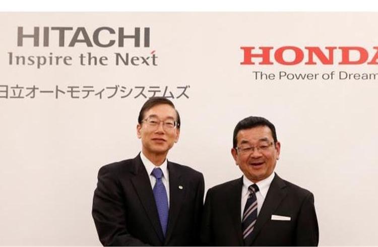 L-R: File photo of Hideaki Seki, president and CEO, Hitachi Automotive Systems and Takahiro Hachigo, CEO, Honda Motor Co, on February 7, 2017.