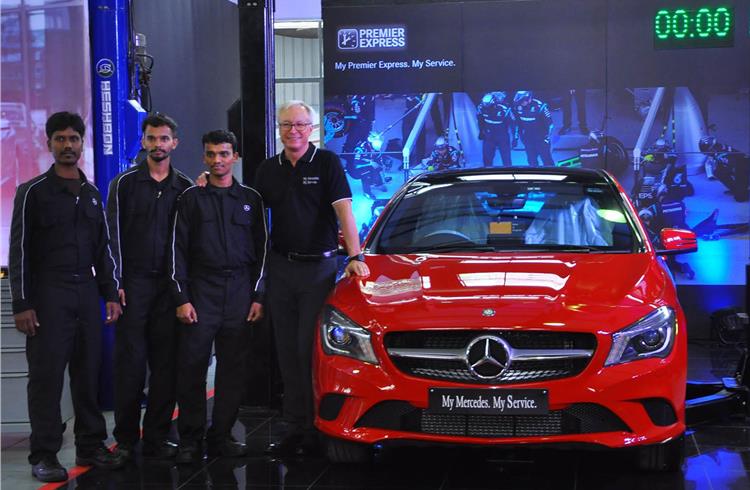 Roland Folger, MD and CEO, Mercedes-Benz India, with the service team at the 'My Mercedes My Service' event in Bangalore today.