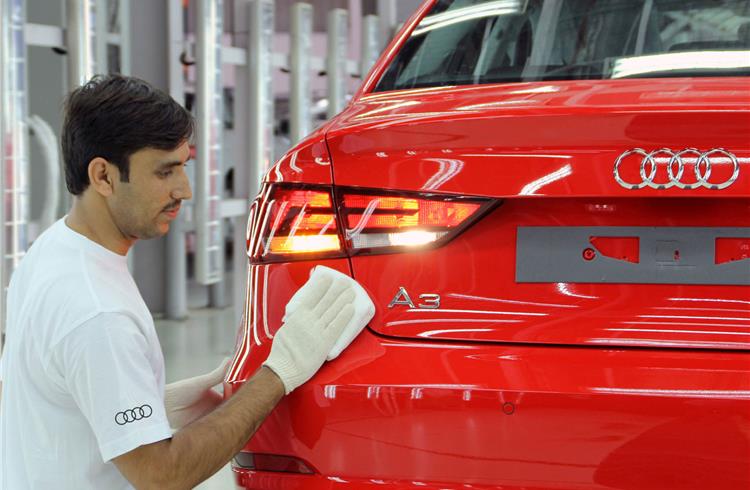 Finishing touches for an A3 at Audi India's Aurangabad plant.