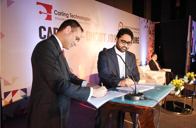 Christopher Sorenson, executive VP, Carling Technologies, and Rahul Dhoot, MD, Dhoot Transmission, seal the JV deal in Pune today.