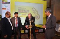 John K Paul, president, FADA; Hormazd Sorabjee, editor, Autocar India, Torsten Bellon, VP, Product Line - Non-Auto, Continental AG; and Jayant Davar, co-chairman and MD, Sandhar Technologies, light the ceremonial lamp.