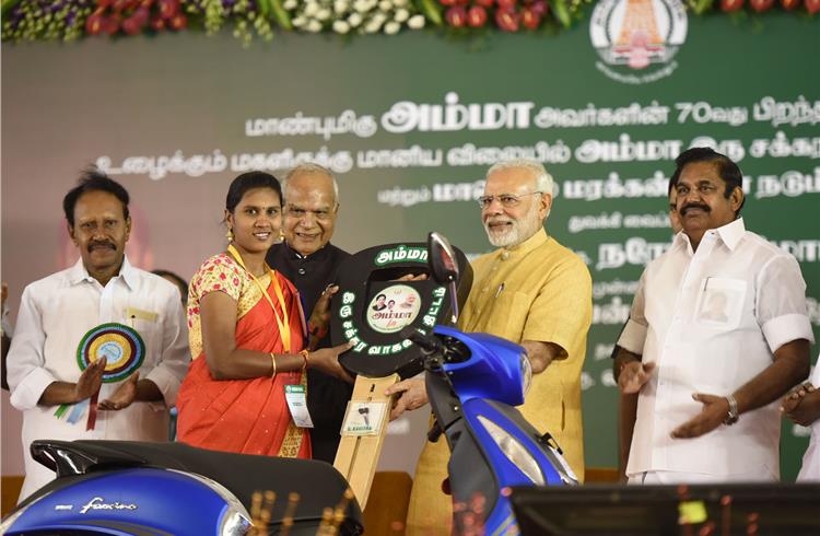 Prime minister Narendra Modi launches the Amma Two Wheeler Scheme, at Kalaivanar Arangam, in Chennai on February 24, 2018. The governor of Tamil Nadu, Banwarilal Purohit and the chief minister of Tami