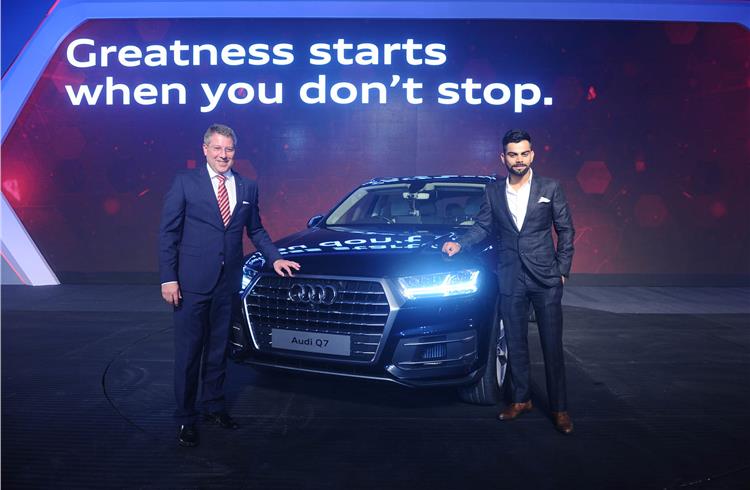 Joe King - Head, Audi India, with cricketer Virat Kohli at the launch of the new Q7 in New Delhi.