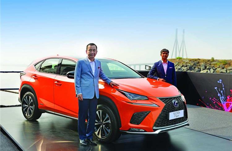 Akitoshi Takemura, President - Lexus India and Arun Nair, Vice-President - Lexus India at the  launch of Lexus' new hybrid electric vehicle - the NX 300h in Mumbai