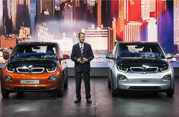 Herbert Diess,seen here with the BMW i3.