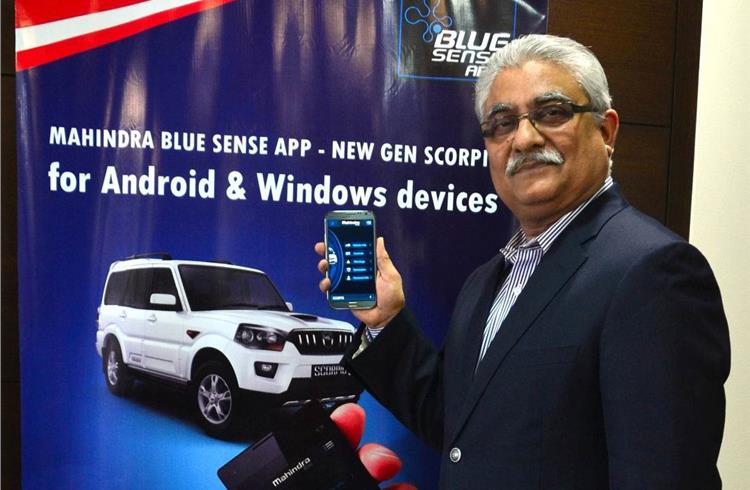 M&M's Rajan Wadhera with the Blue Sense app, which has been designed by the company's electronics team.