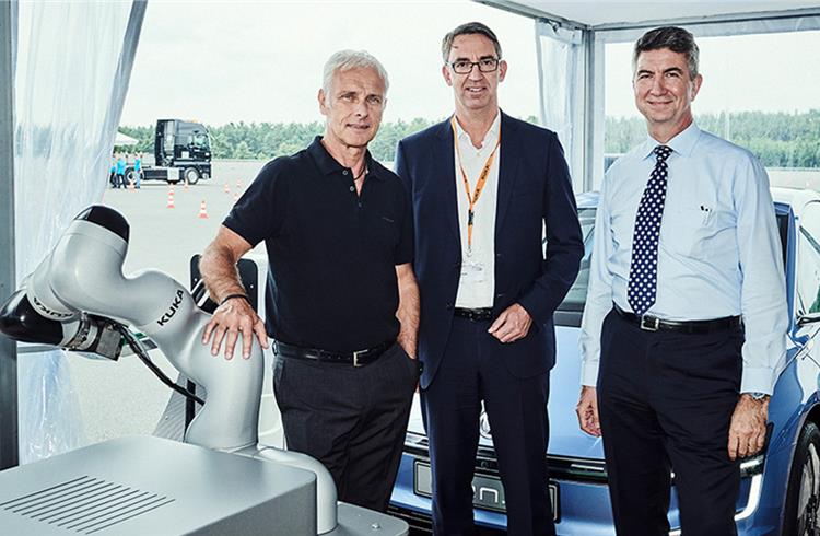 (Left) - Matthias Muller, chief executive officer of Volkswagen, (Right) - Ulrich Eichhorn ,head of research and development at the Volkswagen Group, (Middle) - Till Reuter, the chief executive office