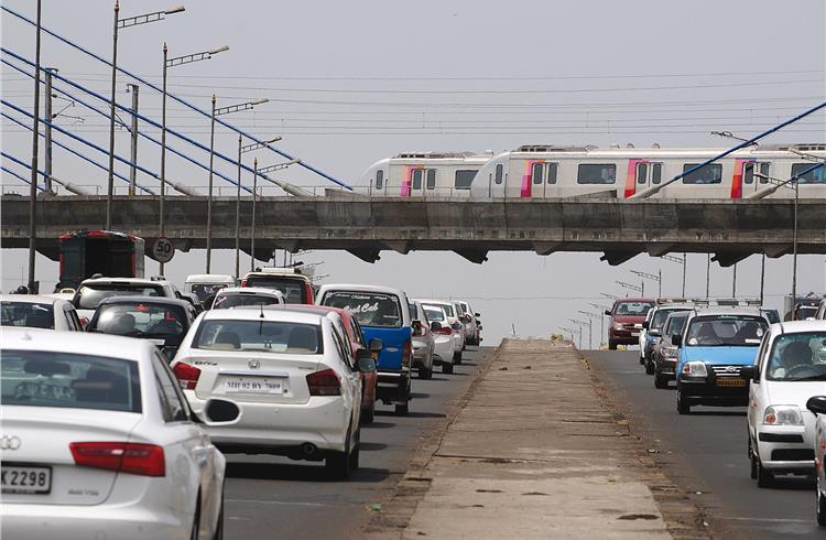 Mumbai's new Metro train zooms over one of the city's busiest flyovers.