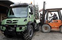 Transporting Christmas trees by Unimog