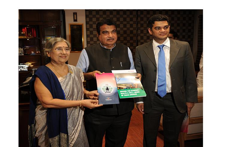 Nitin Gadkari – minister of Road Transport and Highways unveils the Trucker Health report conducted by IMRB and Castrol India alongside Kedar Apte - VP-Marketing, Castrol, India and Dr Hansaji Jayadev
