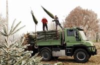 Transporting Christmas trees by Unimog