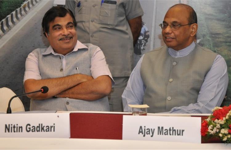 Nitin Gadkari, minister of Road Transport & Highways and Shipping and Ajay Mathur, director general, TERI at the seminar on in New Delhi.