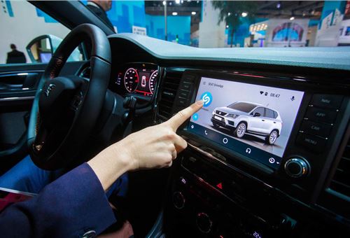 Car makers accelerate smartphone integration in new tech race