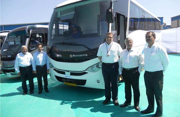 Senior company officials with the Magna. Manufacture of the bus is likely to begin in four months.