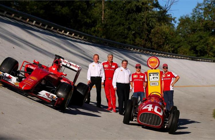 Shell’s John Abbott; Scuderia Ferrari Team's Maurizio Arrivabene; Shell Retail's Istvan Kapitany; Kimi Räikkönen & Sebastian Vettel.