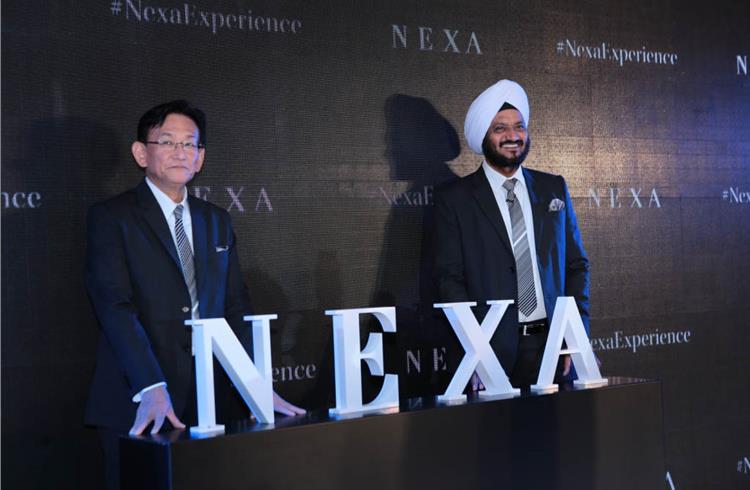 Kenichi Ayukawa, MD & CEO, Maruti Suzuki India, and RS Kalsi, ED (marketing & sales), launch the Nexa premium showroom.