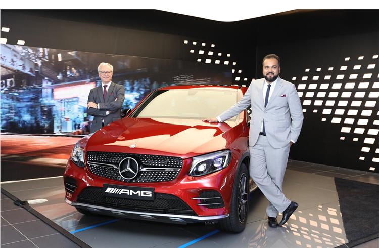 Roland Folger MD & CEO Mercedes−Benz India and Aakash Khaunte, managing director, Counto Motors with Mercedes−AMG GLC 43 Coupe at Counto Motors.