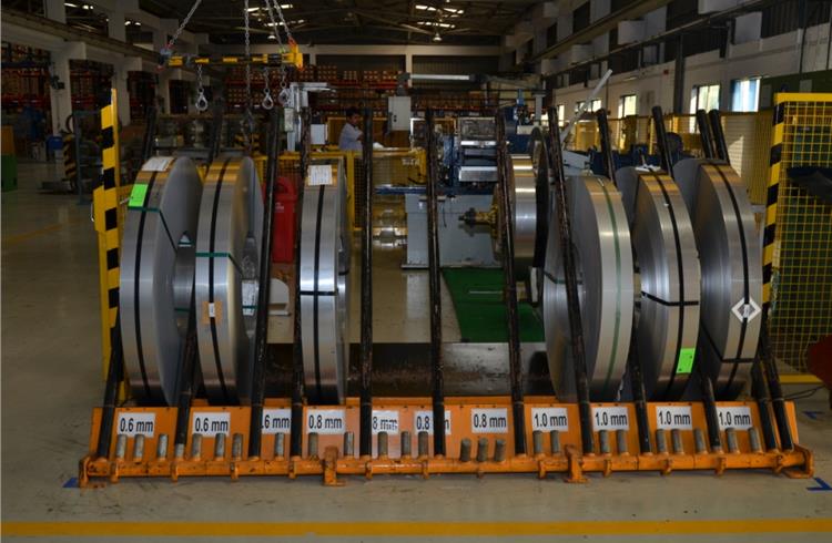 Stock of wide bands of steel, which differ in width and thickness; raw material supplied by POSCO and Outokumpo.