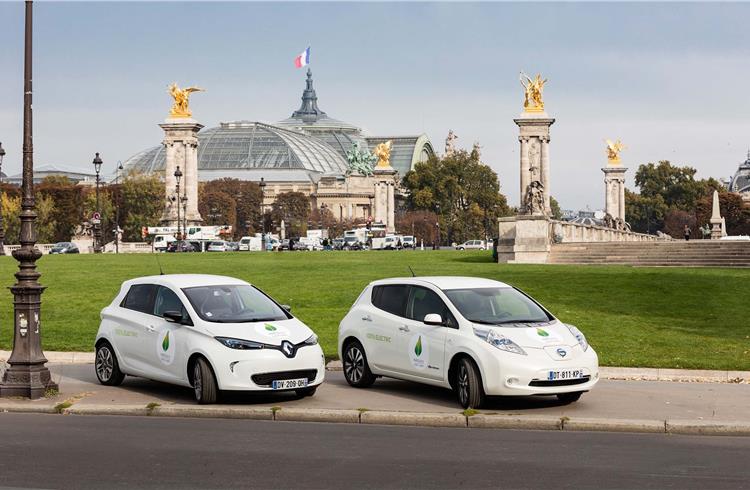 A Renault Zoe and a Nissan Leaf in front of the Grand Palais in paris at the COP21 climate conference last year.