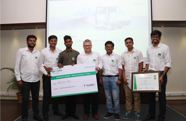 Maharashtra Institute of Technology Pune's (Team MIT) project ‘Hybrid Bike’ bagged the top prize. Seen here with Dr Alfred Rivinius, CTO Europe-Schaeffler Group.