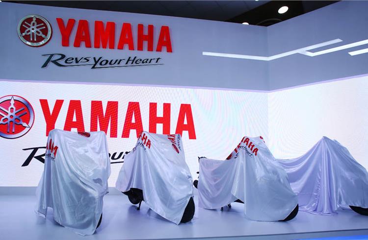 On April 14, India Yamaha Motor will take the covers off its all-new commuter motorcycle and a scooter variant.
