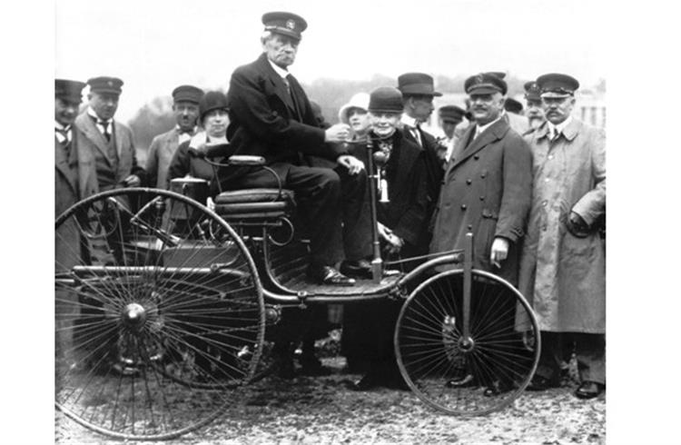 Carl Benz in his first Model I patent motor car from 1886, taken in Munich in 1925.