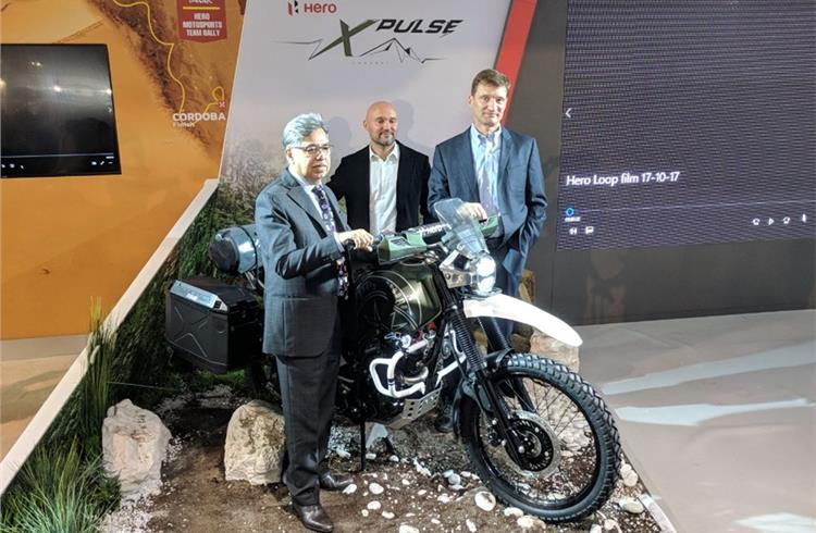 L-R: Hero MotoCorp CMD Pawan Munjal; Malo Le Masson, head - Global Product Planning; and Dr Markus Braunsperger, chief technology officer, with the XPulse adventure concept motorcycle.