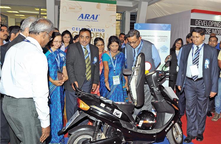 L-R: Rashmi Urdhwareshe, director, ARAI; M R Saraf, senior deputy director, ARAI; Sanjay Mitra, secretary, MoRTH; and Sanjay Bandopadhyaya, CEO, NATRiP, with the prototype two-wheeler which uses ISRO’