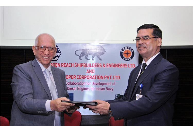 Farrokh N. Cooper, chairman and managing director, Cooper Corporation and Sri Sarvjit Singh Dogra, director finance, GRSE exchanging the MoU, signed for a joint collaboration.