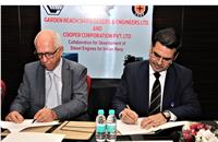 Farrokh N. Cooper, chairman and managing director, Cooper Corporation and Sri Sarvjit Singh Dogra, director finance, GRSE, signing the MoU.