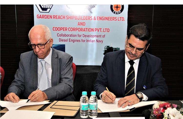 Farrokh N. Cooper, chairman and managing director, Cooper Corporation and Sri Sarvjit Singh Dogra, director finance, GRSE, signing the MoU.