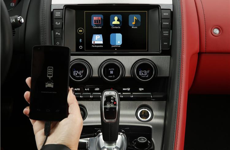 justDrive integrates multiple smartphone apps into a single, voice-activated in-car experience.