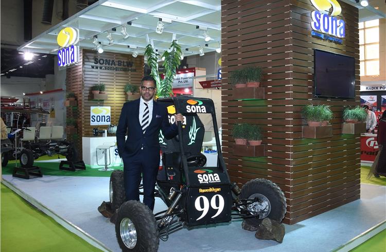 Sunjay Kapur, MD, Sona BLW Precision Forgings, with the e-axle-fitted Baja vehicle.