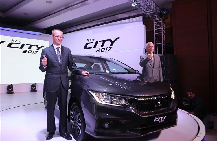 (L-R) Yoichiro Ueno, president and CEO, and Raman Kumar Sharma, VP, Honda Cars India, at the launch of the new City.