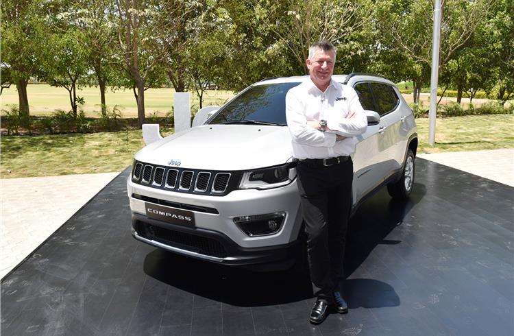 Kevin Flynn, president and MD, FCA India with the Jeep Compass for India.