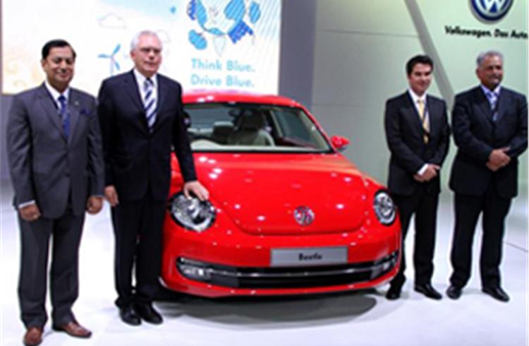 VW unveils Beetle, XL1, launches Touraeg